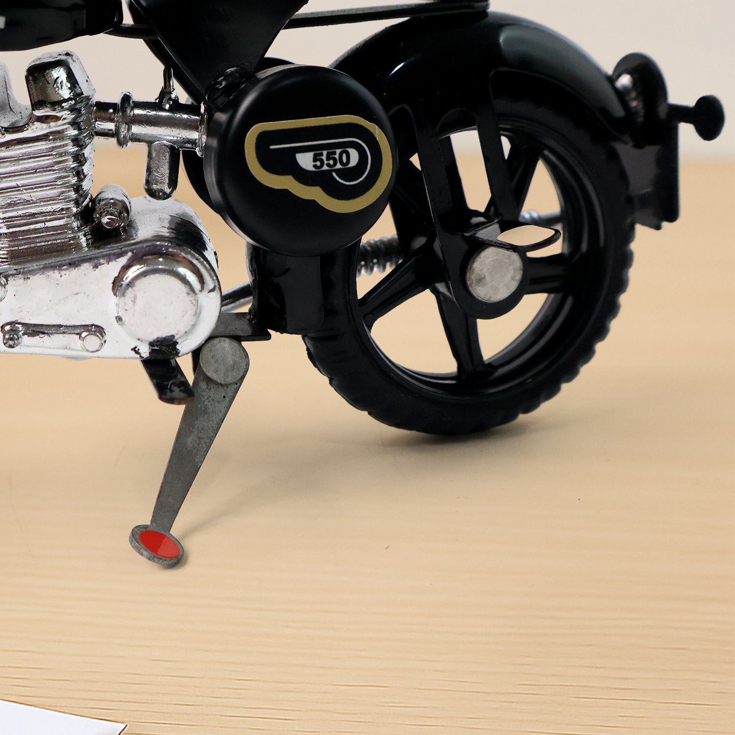 Bullet bike toy model shown with side stand for stable display