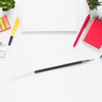 Various angles of the InkGlow black pen refill, showcasing its complete structure.