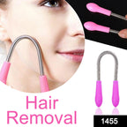Close-up view of the flexible spring mechanism of the facial hair removal tool.
