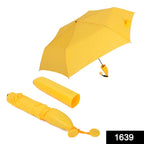 Yellow banana shaped umbrella, compact and stylish for travel.