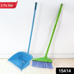 Close-up of dustpan teeth combing dust from brush bristles in dustpan and brush set