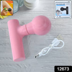 Black mini body massager shown with its charging cable.