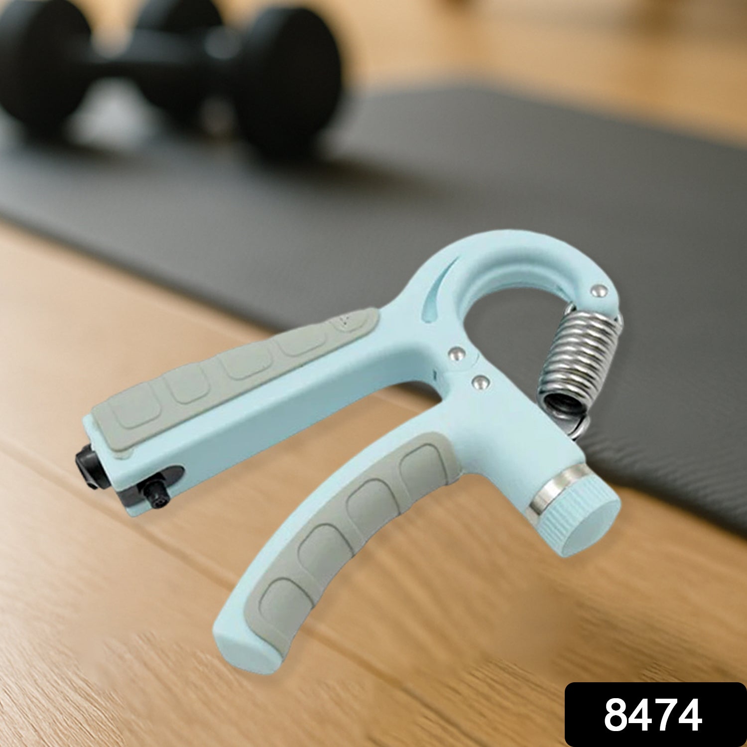 Close-up of the portable hand grip strength trainer for daily use.