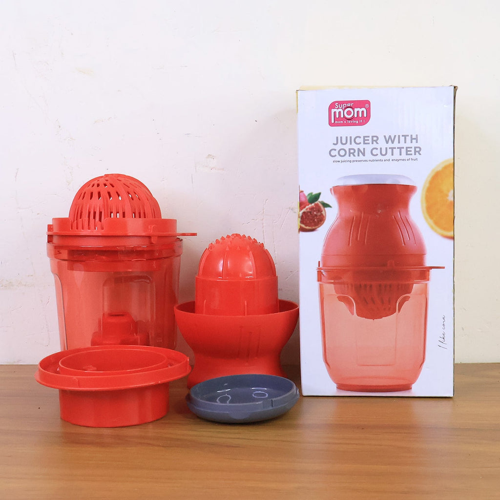 Manual juicer filled with fresh citrus fruit ready for juicing
