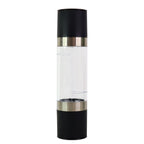 Clear acrylic chamber displaying salt and peppercorns inside grinder