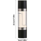 Manual dual-chamber salt and pepper grinder being used in kitchen