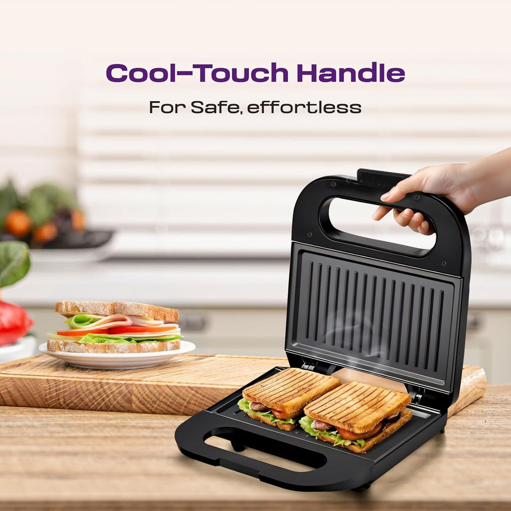 Orbit sandwich toaster maker open, displaying non-stick plates