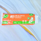 Soft, rash-free cotton top sheet on sanitary pads for sensitive skin