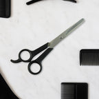 Hair thinning scissors showing detailed micro-toothed blade for bulk reduction