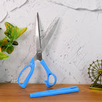 Angled side view of the Carbo Titanium scissors, highlighting the ergonomic bent handle.