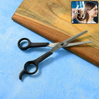 Front view of professional hair thinning scissors with ergonomic finger rest