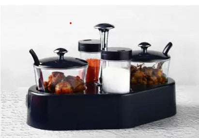 Full view of Ganesh Spice Condiment Set with transparent jar and colourful lid.