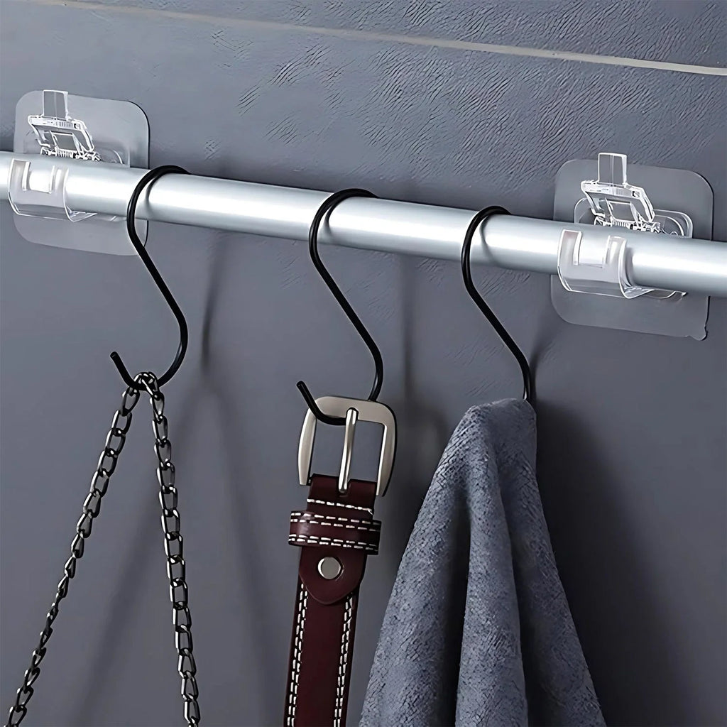 No-drill transparent wall hook fixed on a wall, supports everyday items