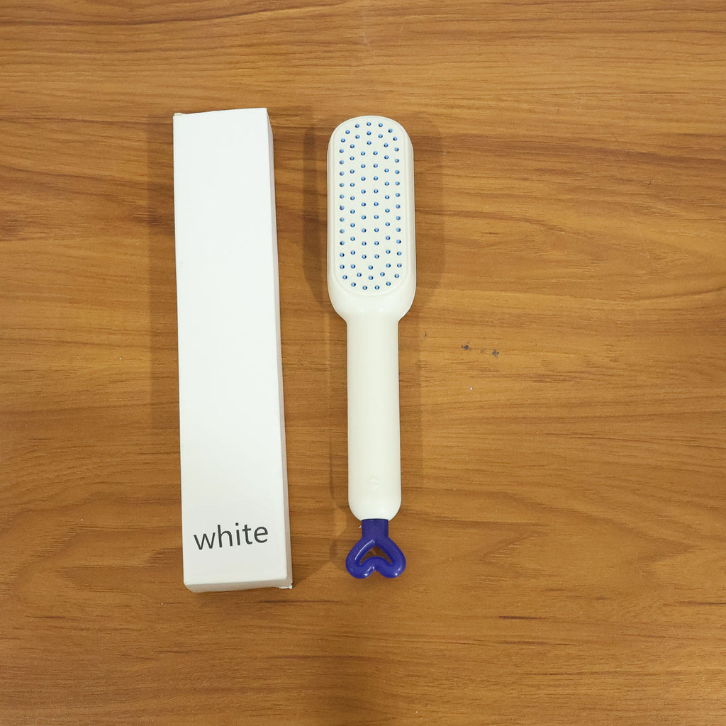 The Self-Cleaning Hairbrush removing trapped hair instantly after use
