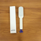 The Self-Cleaning Hairbrush removing trapped hair instantly after use