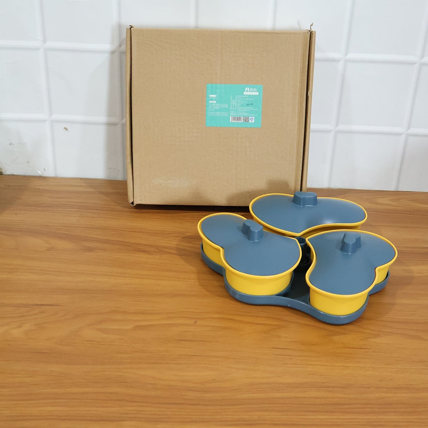 Reusable plastic snack serving tray with three compartments for versatile use