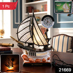 Decorative nautical ship clock lamp with glowing sails