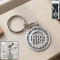 Close-up of Lord Shiva engraved on metal keychain