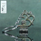 Om Shivling metal keychain showing front view and spiritual design