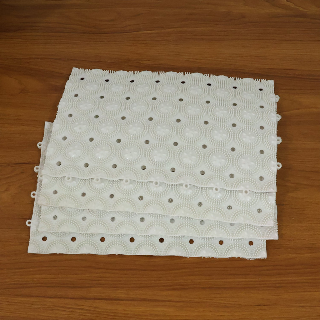Bathroom floor setup with multiple anti-slip massage bath mats installed