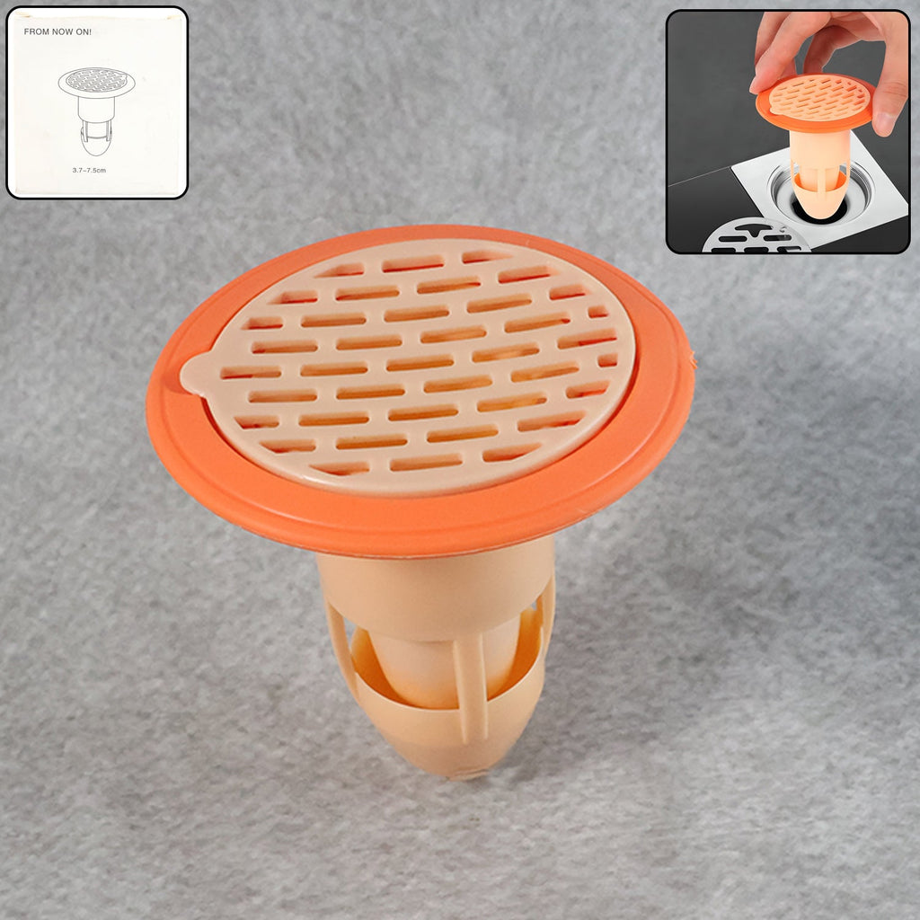Plastic drain strainer with hair catcher installed in a bathroom shower drain