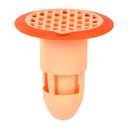 Bathroom floor drain covered by plastic strainer trapping hair and debris
