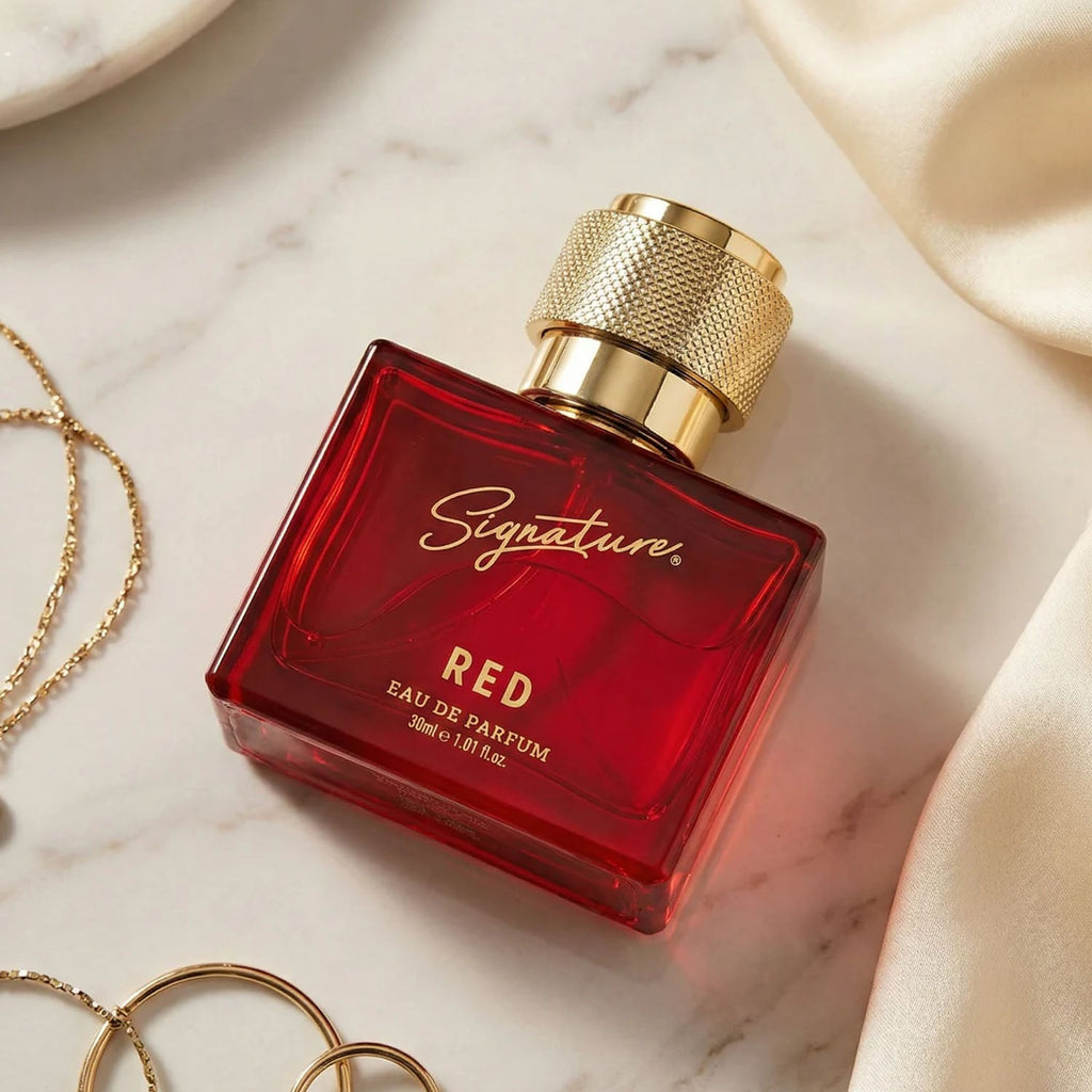 Signature red perfume bottle ready for travel and gifting