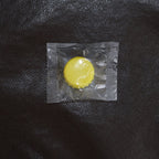 Reusable silicone bottle cap cover in use