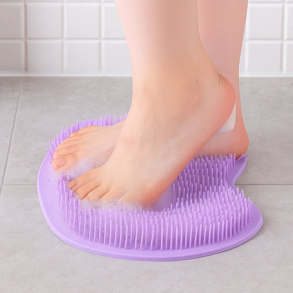 Top view of purple silicone foot scrubber mat with suction cups