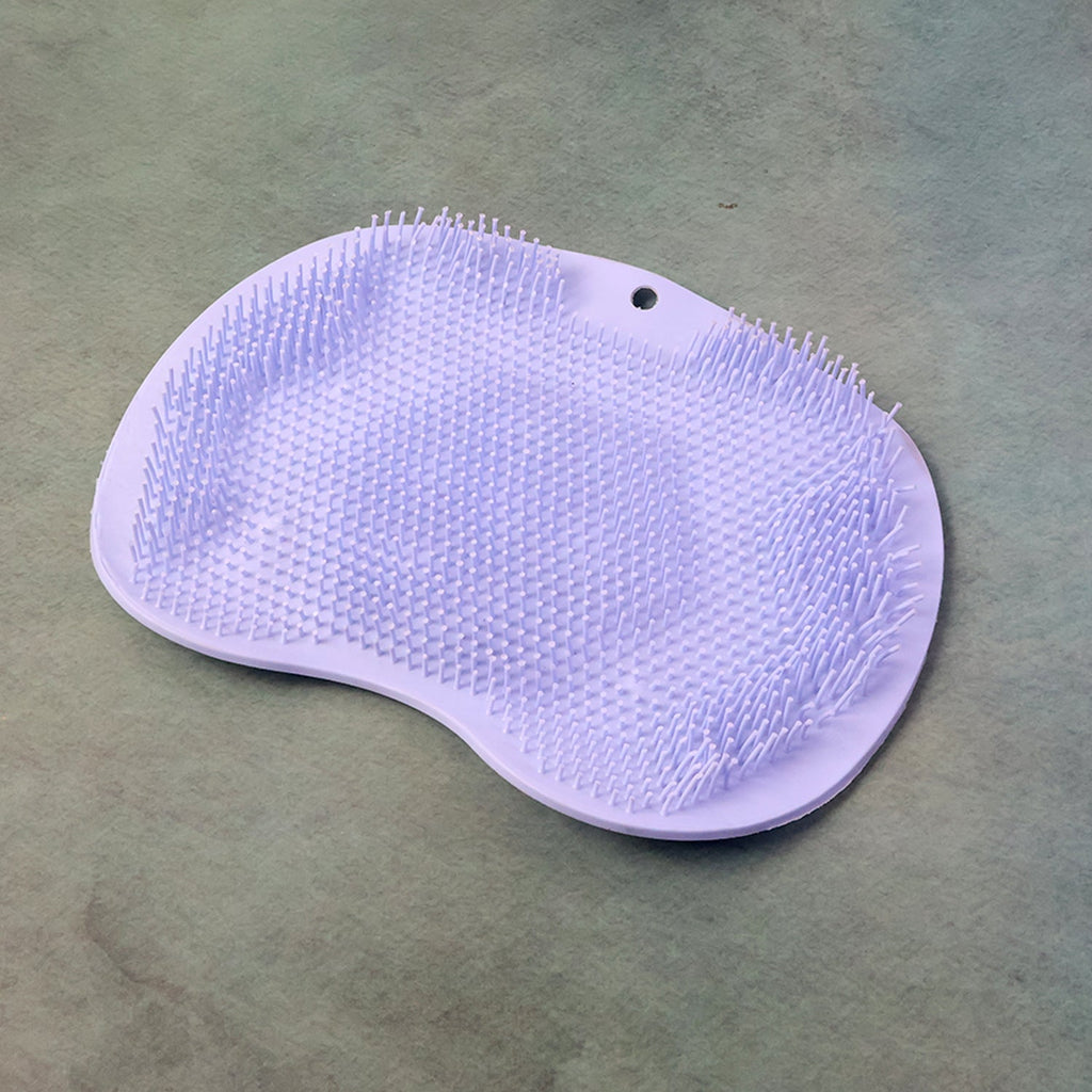 Silicone scrubber bath mat featuring anti-slip suction cups for stability