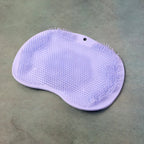Silicone scrubber bath mat featuring anti-slip suction cups for stability