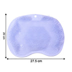 Massage brush mat in purple silicone with textured bristles for foot care