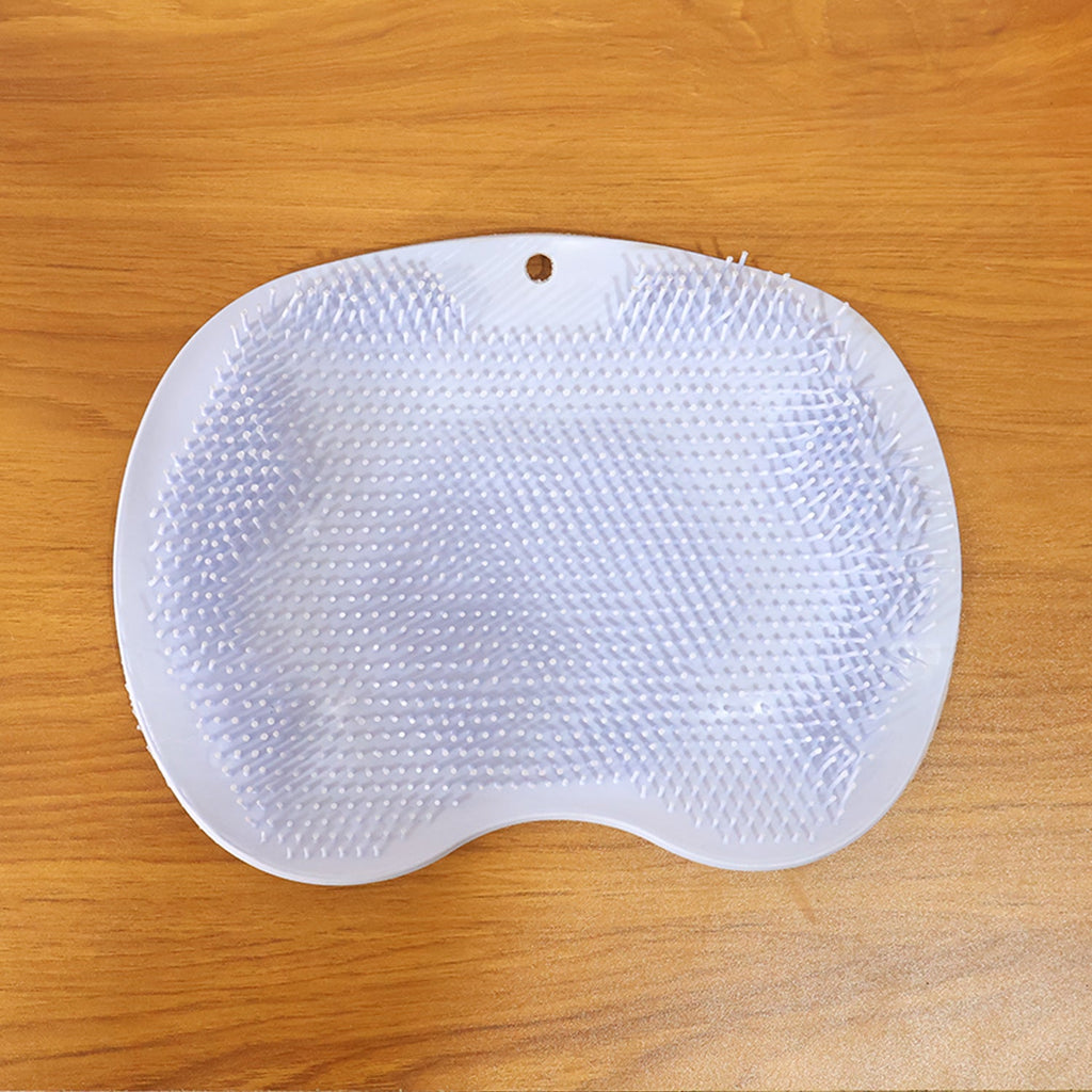 Purple silicone bath massage cushion showing flexible bristles and suction cups