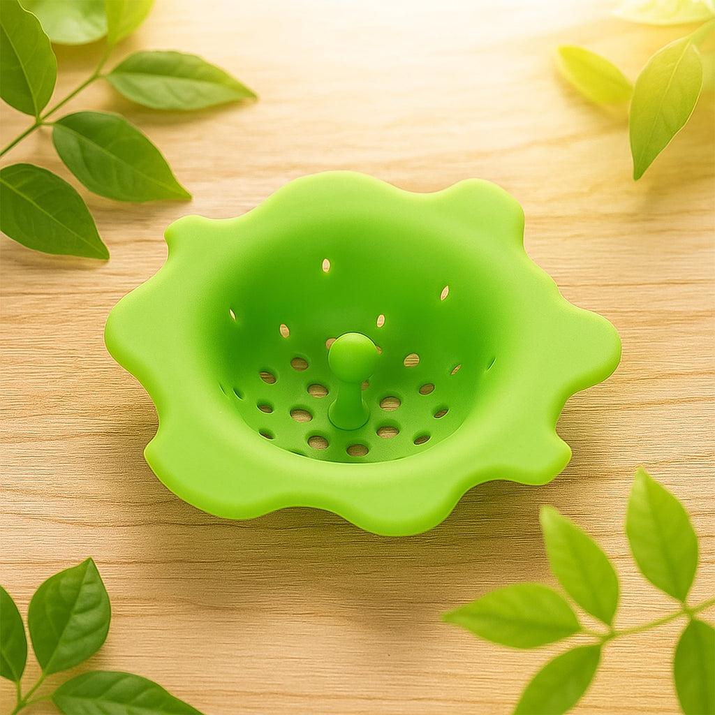 Silicone sink strainer used in household kitchen sink to catch food scraps.