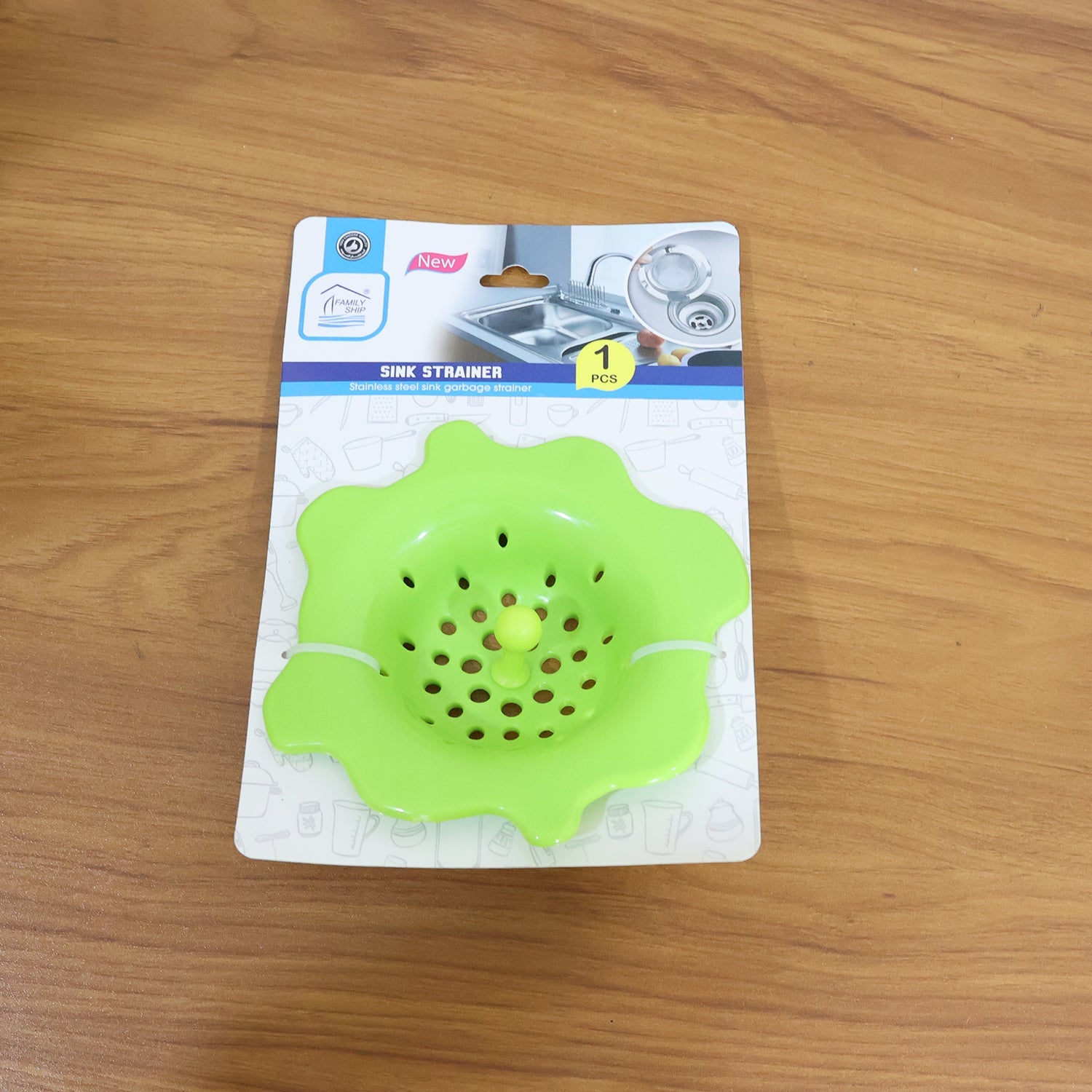 Durable silicone strainer shown with center pull knob for hygienic removal.