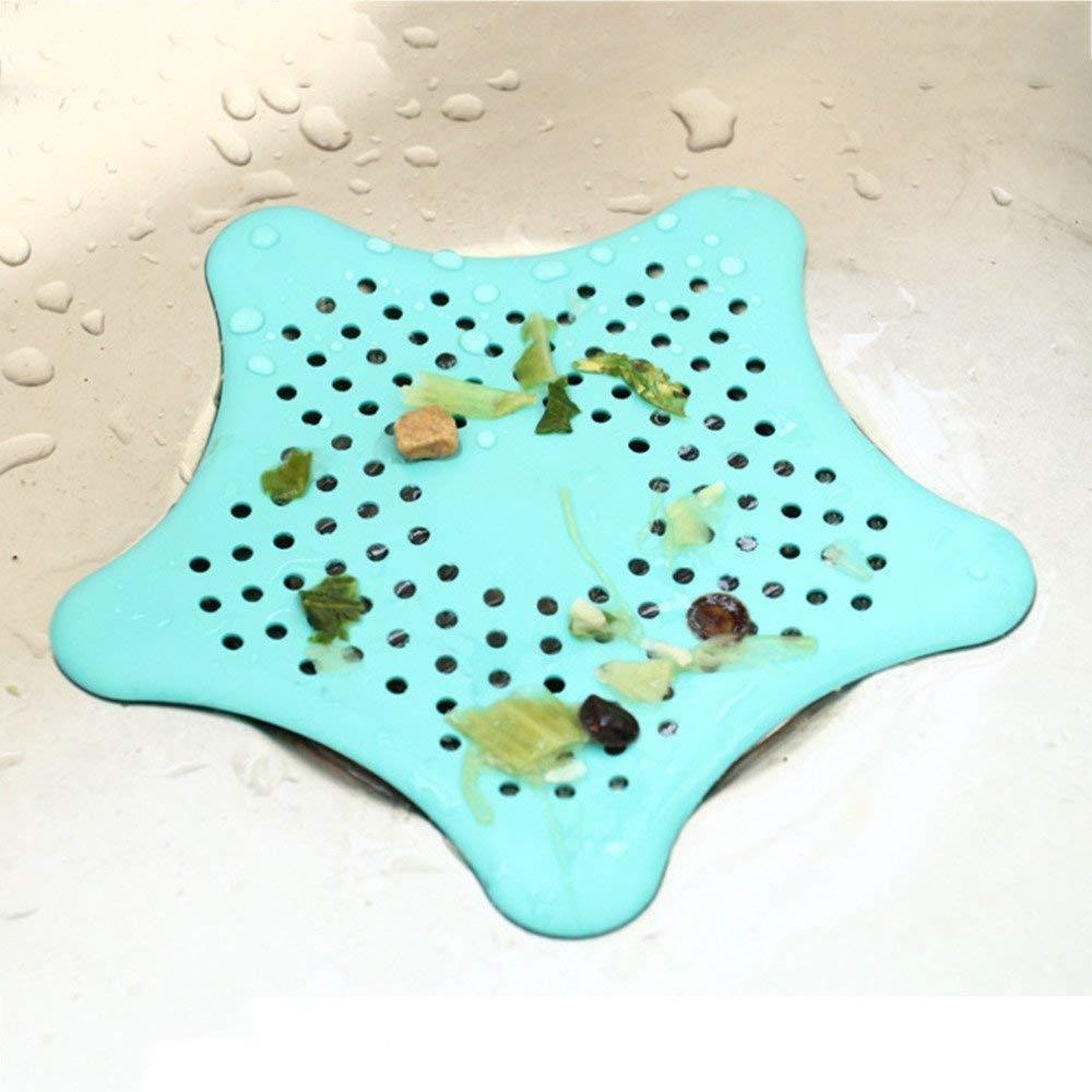 Star-shaped silicone sink hair catcher preventing clogs in a bathroom.