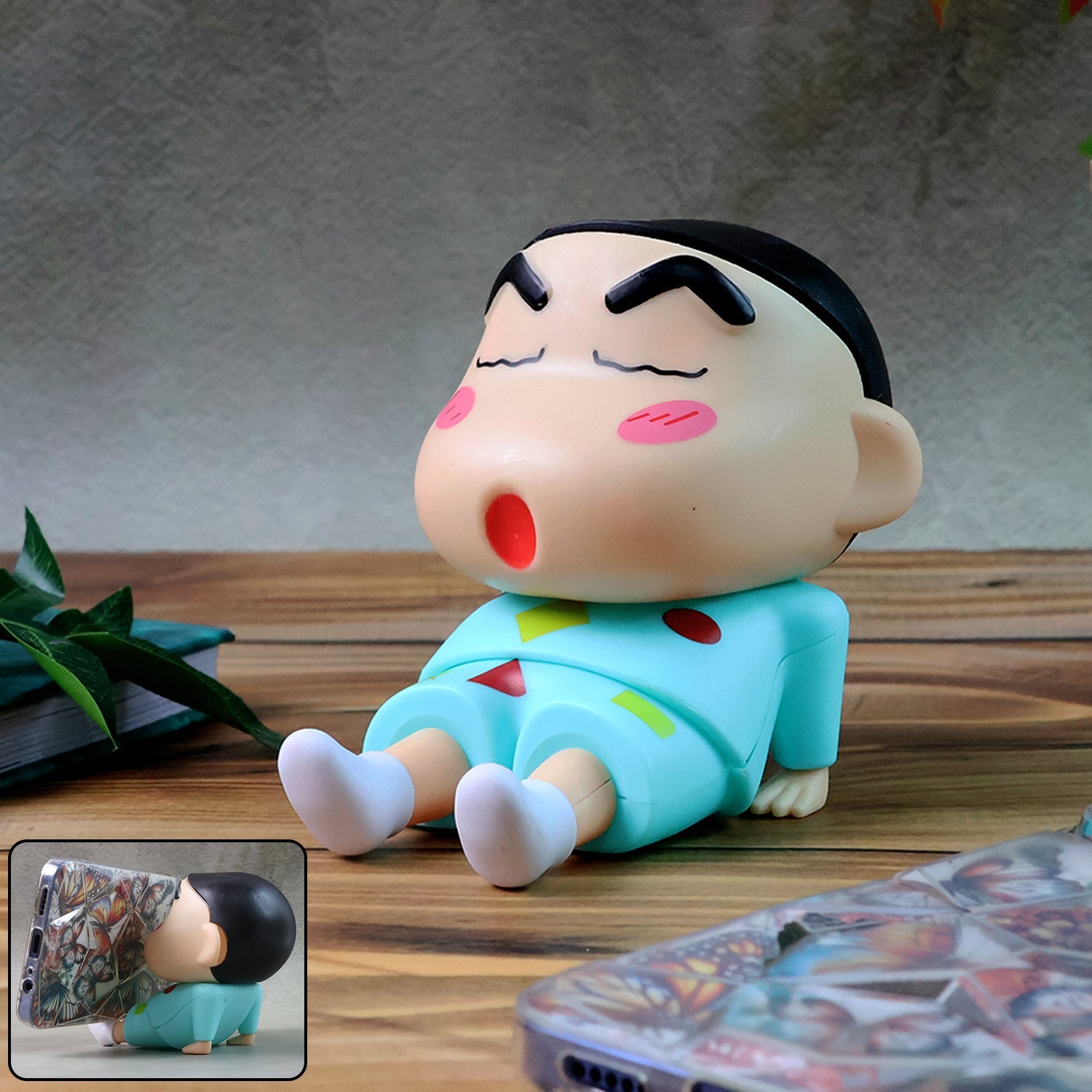 Front view of cute cartoon figurine mobile phone stand for smartphones