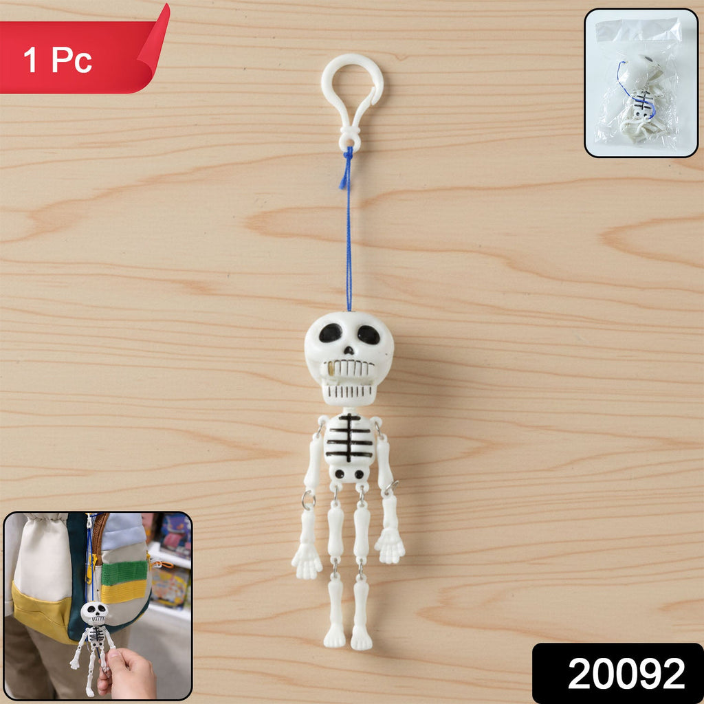 Close-up of skeleton keychain charm with articulated limbs