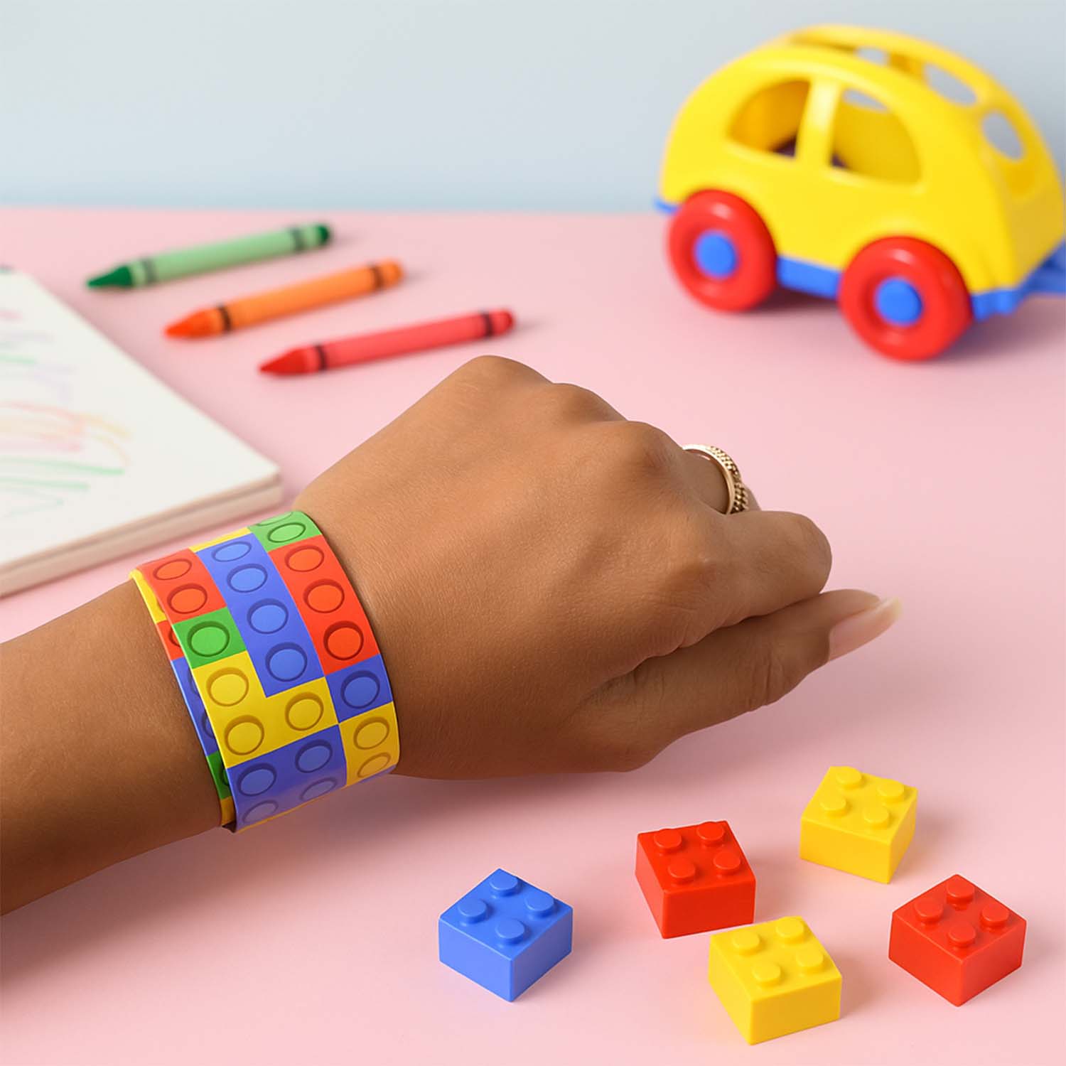 Snap slap bracelet toy snapped snugly around a child's wrist