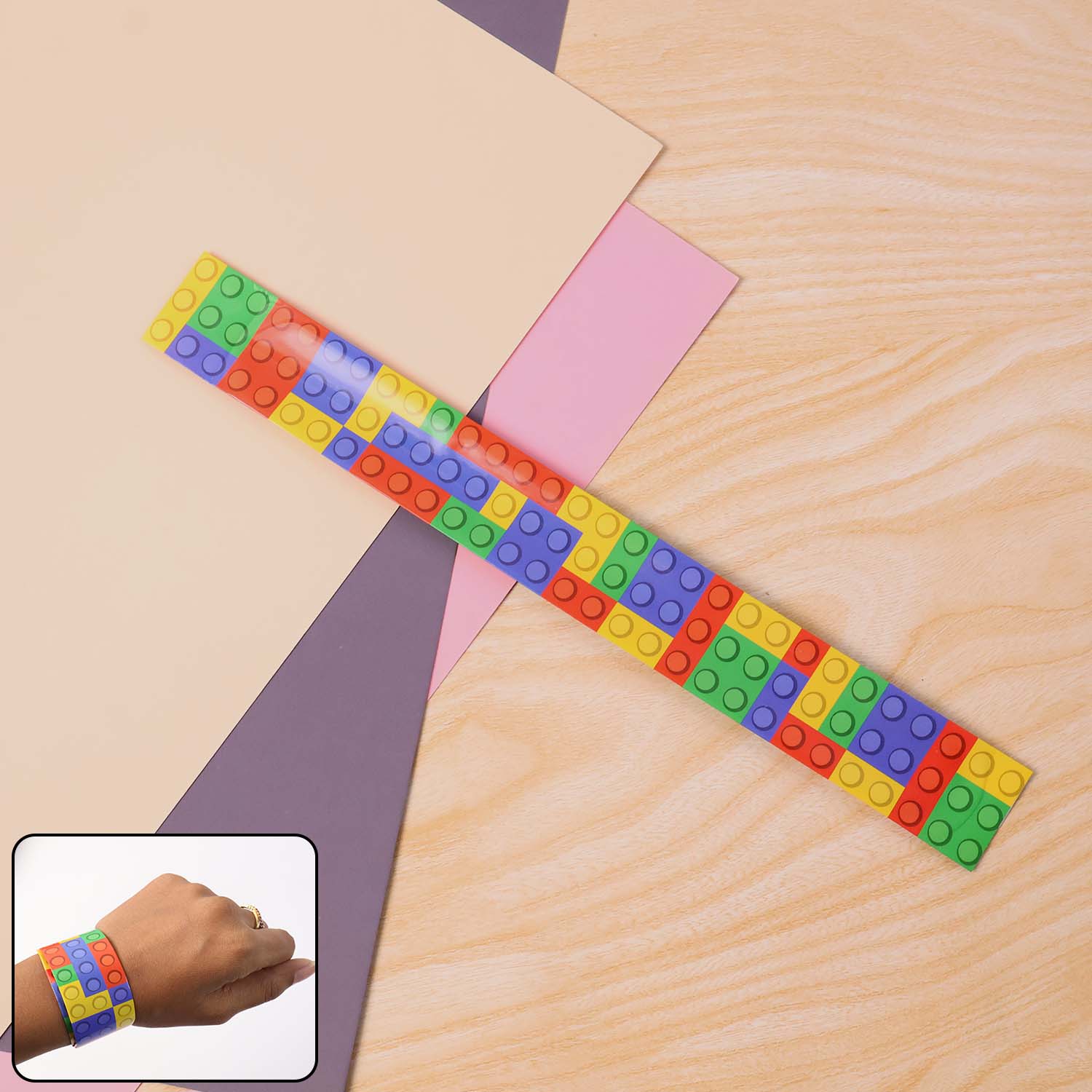 Single colorful snap slap bracelet toy displaying bright colors