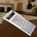 Fruit cutting tool slicing fresh fruits in the kitchen