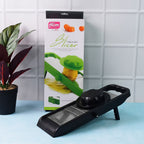 Detailed view of the wavy laser-edge stainless steel blade on the adjustable slicer.