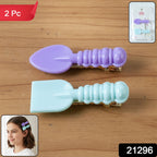 Closeup of stylish mini spade and leaf hair clips