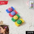 Close-up of smiley face snap hair clip in the colorful candy style