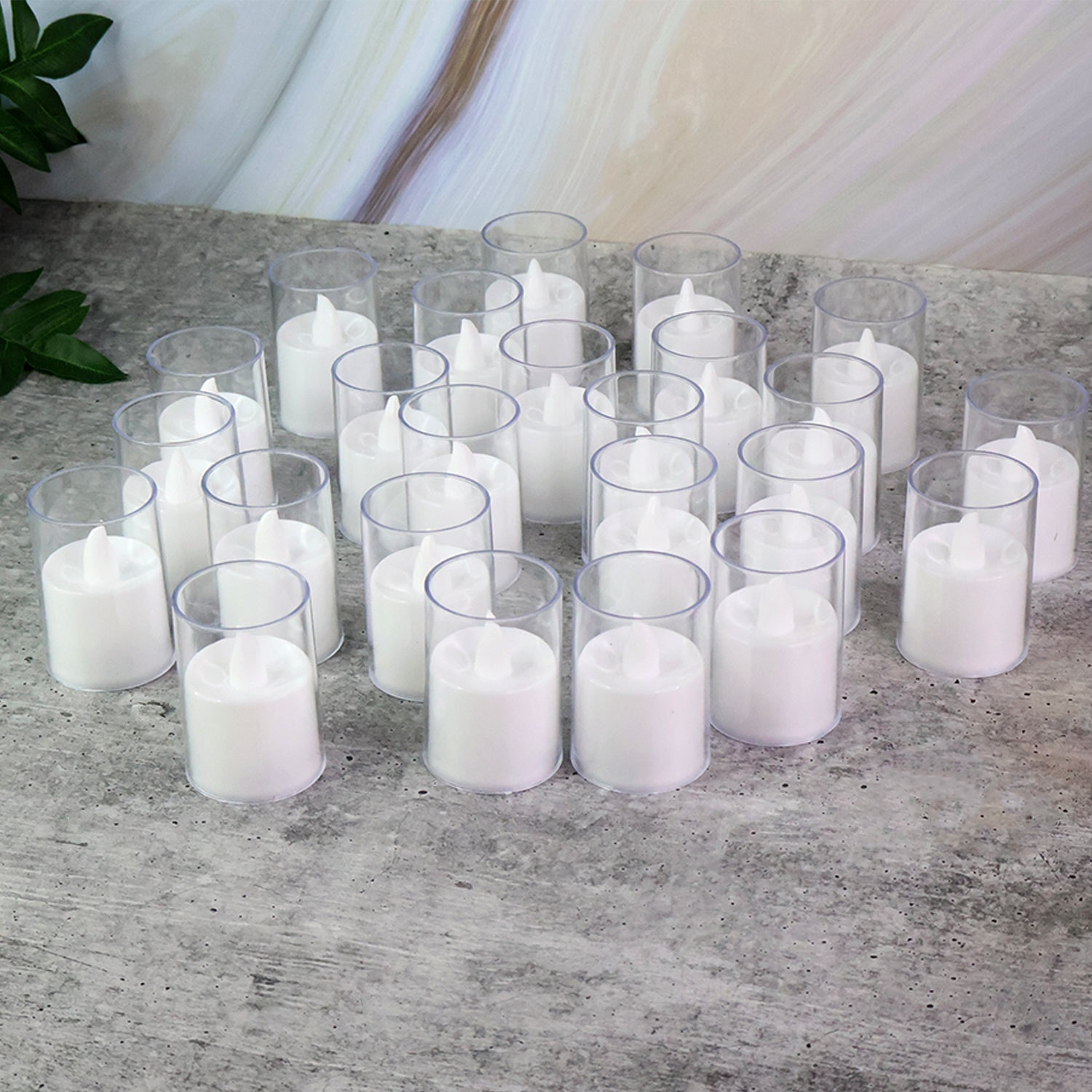Transparent glass holder on battery-operated LED tealight candle