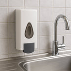Two wall mounted soap dispensers in a white bathroom, highlighting design.
