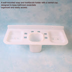 Close-up of the two-part plastic soap dish separated, showing the removable drainage tray.