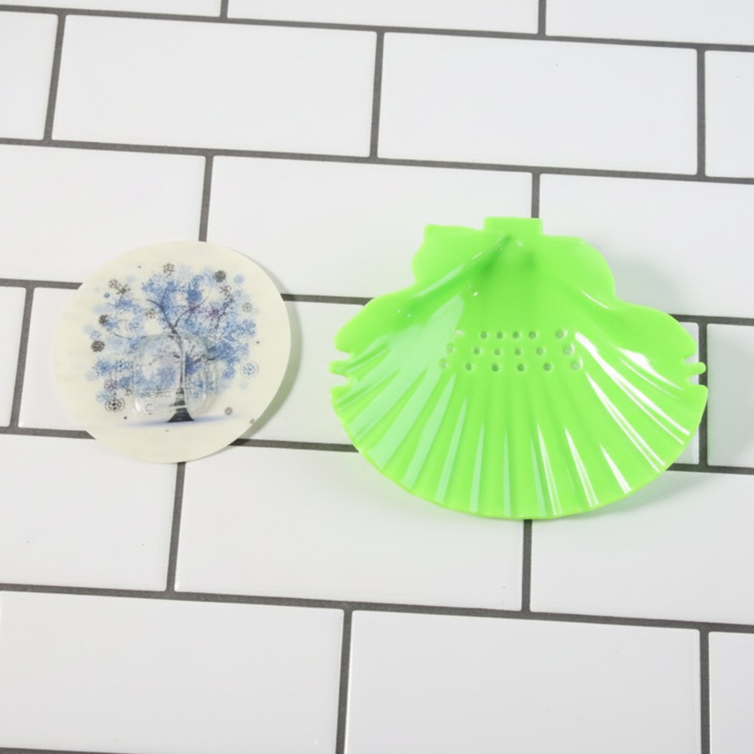 Wide spacious shell-shaped soap tray mounted on bathroom wall