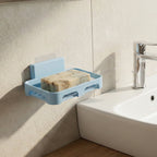 Durable plastic soap dish featuring water drainage slots
