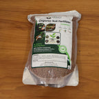 Organic soil fertilizer granules promoting healthy plant growth